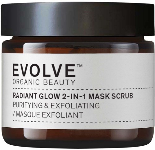 Brun krukke med svart lokk, etiketten sier 'EVOLVE Organic Beauty Radiant Glow 2-in-1 Mask Scrub' for rensing og eksfoliering av huden.