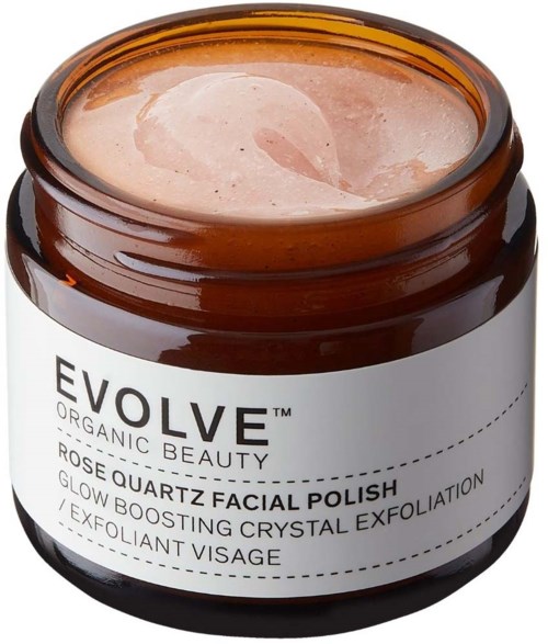 En liten krukke med rosenkvarts ansiktspeeling med glitter, merket 'EVOLVE' for glødende hud og eksfoliering.