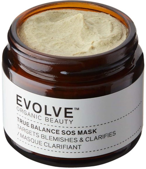 En Brun krukke med en lysfarget kremet ansiktsmaske merket "EVOLVE TRUE BALANCE SOS MASK".
