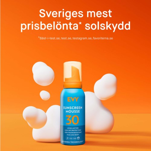 A blue sunscreen mousse bottle with SPF 30 is surrounded by white foam bubbles against an orange background.
