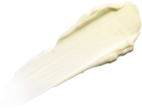 Ein Streifen cremige, weiße Substanz, glatt und dick, wahrscheinlich Lotion oder Creme.