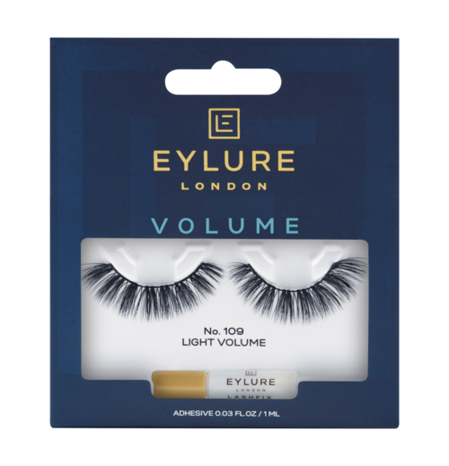Eyelash packaging featuring a blue background, gold logo, and false eyelashes with a small tube of adhesive.