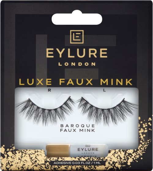 Falska minkögonfransar i svart och guld från Eylure London. De är märkta som lyx och barockstil.