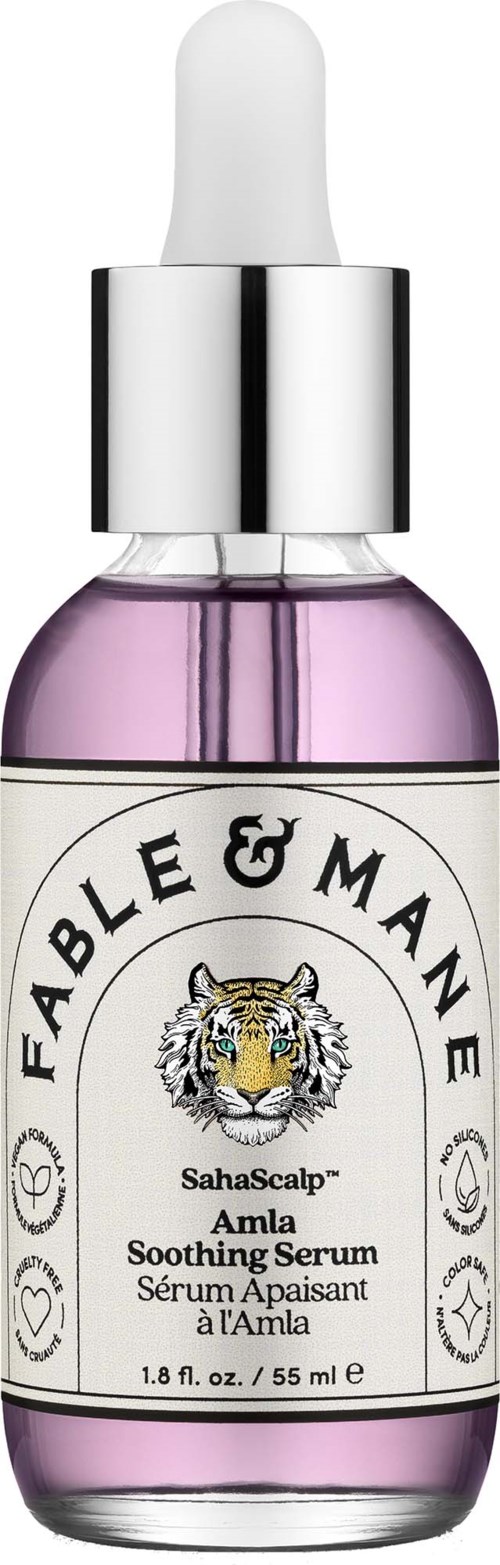 En liten glasflaska med lugnande serum med pipett, etikettdel med tigerillustration och varumärkesnamn.