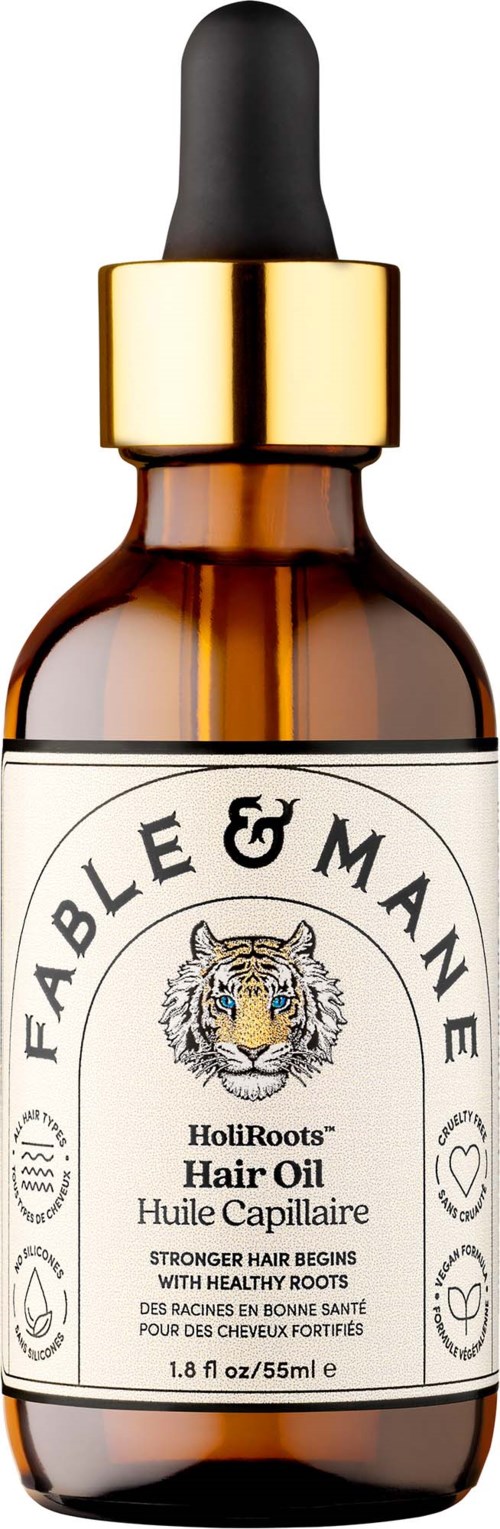 Kopparmärkt glasflaska med svart pipettlock innehållande Fable & Mane HoliRoots hårolja. Etiketten har en tiger och text.
