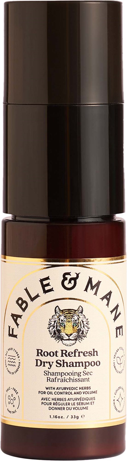 En liten flaska av Fable & Mane Root Refresh torrschampo med svart lock och beige etikett med tigerlogga.