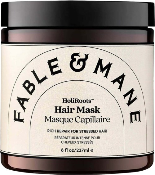 En hårmaskburk med svart lock och en etikett som står Feable & Mâne Hair Mask för stressat hår, 8 fl oz.