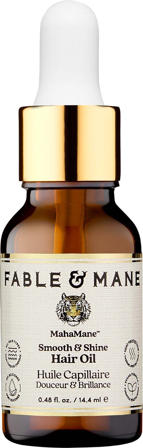 Guldbelagt dropperflaska med Fable & Mane Smooth & Shine hårolja, vit kork och guldkant.