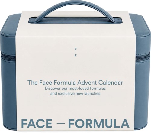 En vit och blå necessär med handtag, visar text om The Face Formula Advent Calendar.