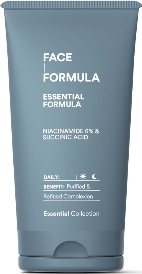 Een blauwe tube met label Face Formula met ingrediënten niacinamide en salicylzuur, beweert de huid te reinigen en te verbeteren.