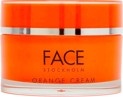 Oranje potje met 'FACE Stockholm Orange Cream'-label, voor huidverzorging of make-up.