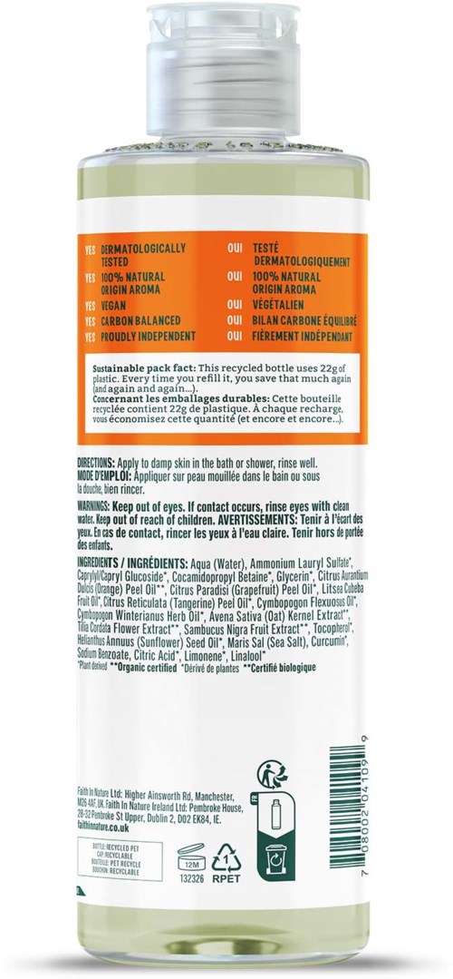 A clear bottle with a label that has orange, green, and white sections, containing a liquid product.