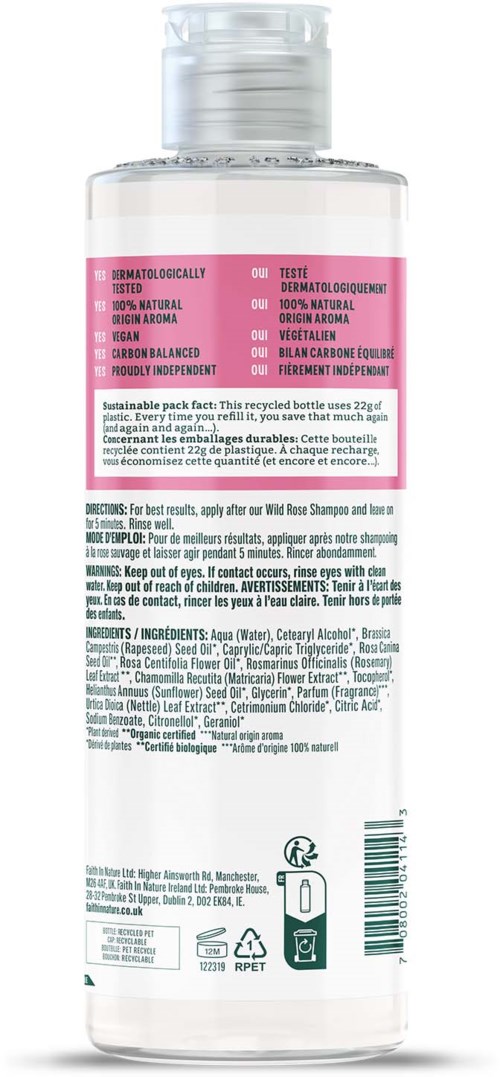 A transparent bottle with a pink label, containing a cosmetic product. Instructions and ingredients are listed on the back.