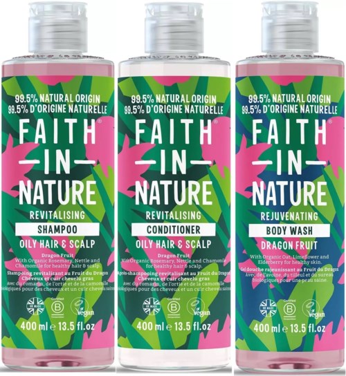 Three bottles of hair and body care products with bright pink and green labels promoting natural ingredients.
