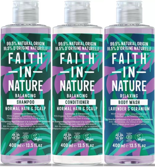 Three bottles of hair and body care: shampoo, conditioner, and body wash, with lavender scent and natural ingredients.