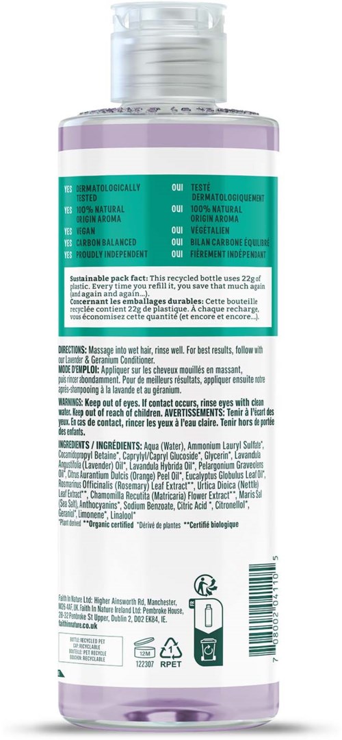 A clear bottle with purple liquid, labels with instructions, ingredients, and a barcode, designed for hair care.