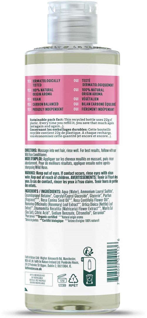 A clear bottle with a pink label containing skincare product details and instructions.
