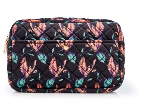 A small quilted bag with colorful feather and leaf patterns on a dark background, with a zipper and gold button.