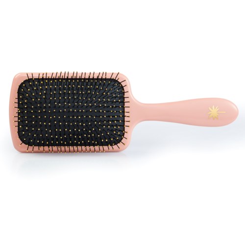 A pink hairbrush with a black pad and gold-tipped bristles, and a yellow star design on the handle.