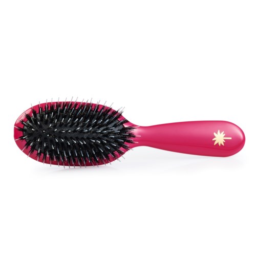 A pink hairbrush with black bristles and a star on the handle.