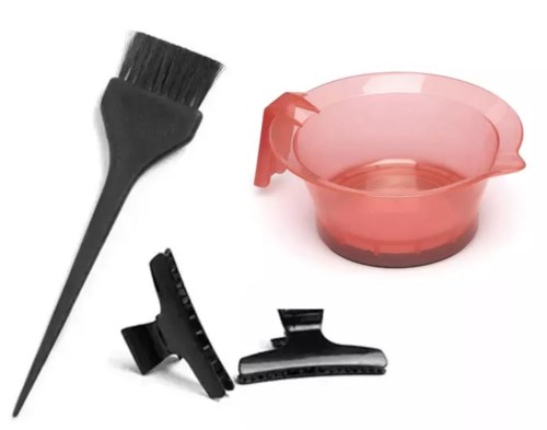 A small pink bowl, a black brush, and two black clips are shown on a white background.