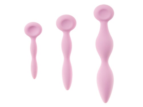 Drei rosa Gesichts-Massagegeräte in verschiedenen Größen mit abgerundeten Enden.