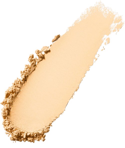 A beige powder spread unevenly with a rough edge, resembling a swatch of makeup or cosmetic product.