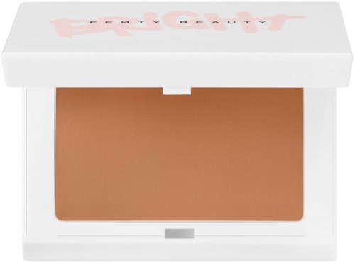 A white rectangular compact with blush inside and a partially open lid, with the text readable on the lid.