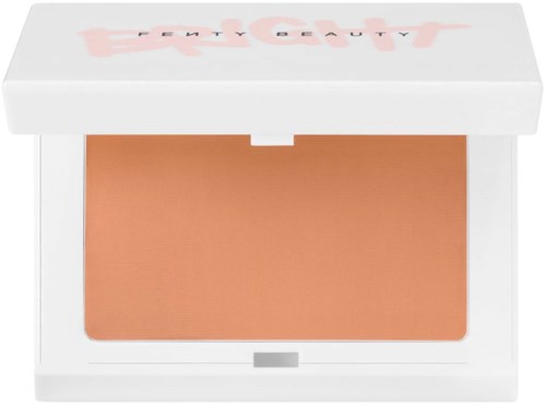 A compact makeup bronzer with a white case and a pink and black logo on the top.