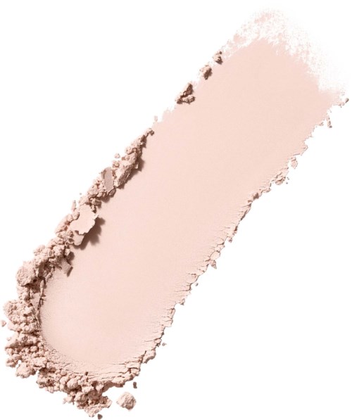 A light pink pressed powder with some loose powder on the side. It appears smooth and used for makeup.