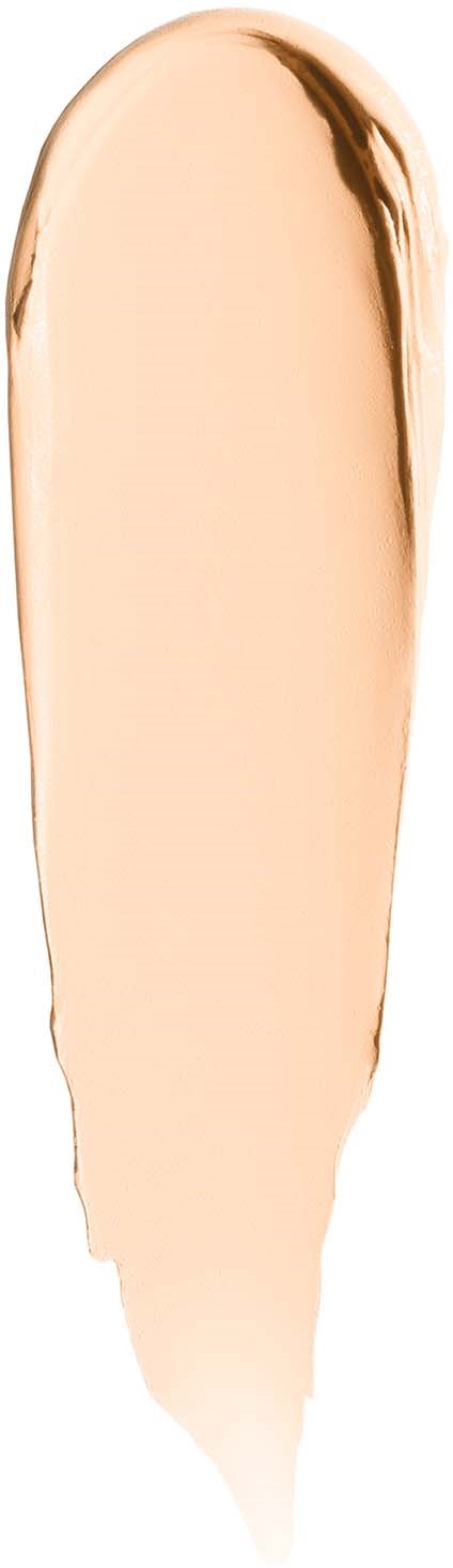 A beige makeup swatch with a dark brown edge, shaped like a teardrop.