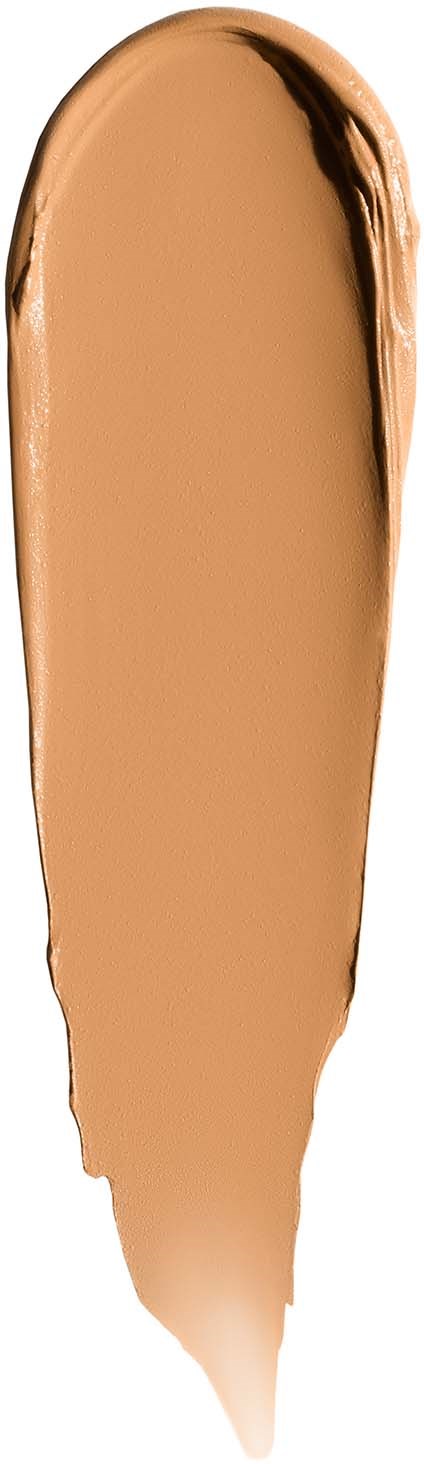 A smear of beige liquid makeup with darker edges, shaped like a vertical brush stroke.