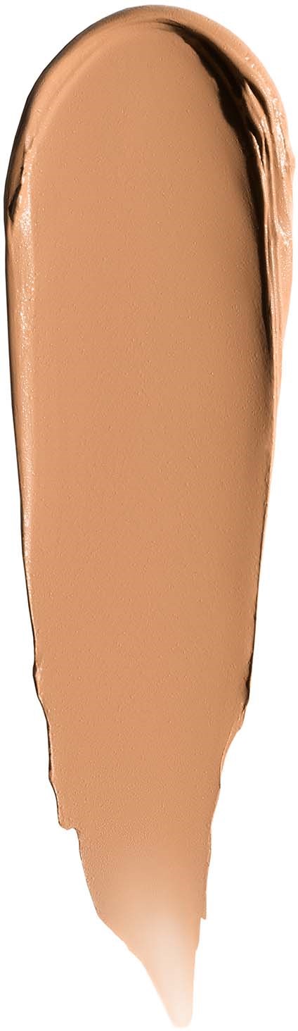 A swatch of liquid foundation or concealer in a beige shade with darker edges.