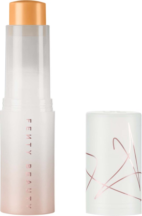 A white bottle with a gold cap and a separate white cap with pink swirling lines.