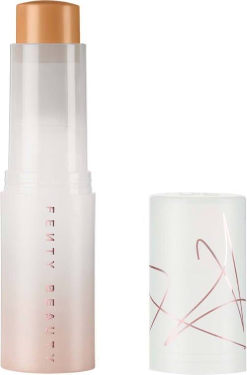 A tall white bottle with a gold cap and pink text, and a white cap with pink lines. Likely a cosmetic product.