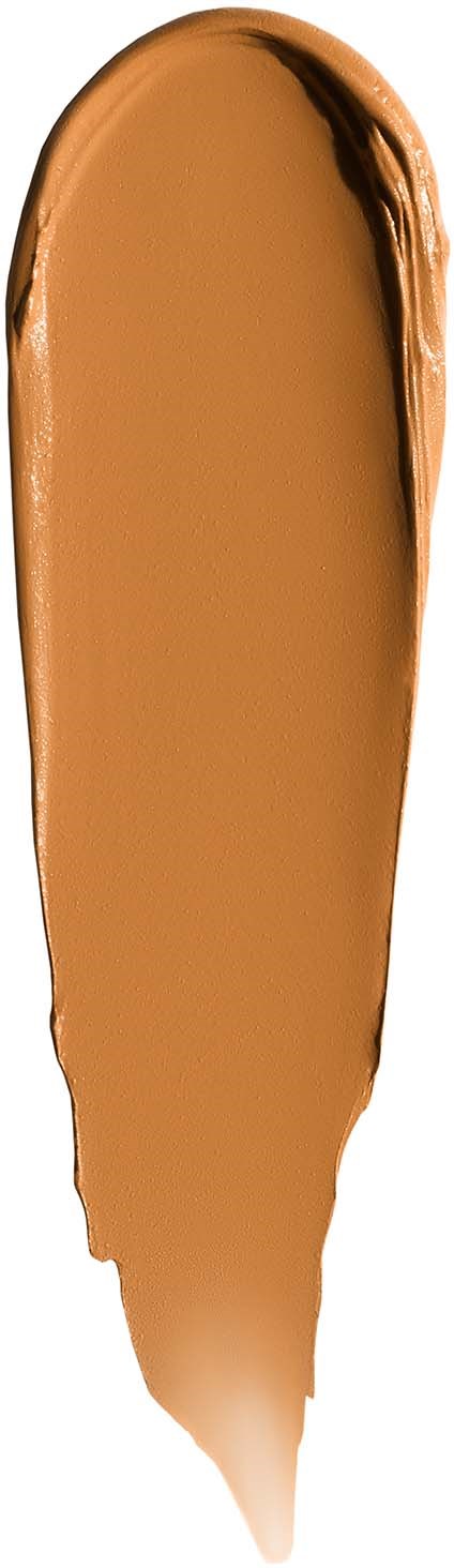 A swatch of light brown liquid foundation or concealer on a white background.
