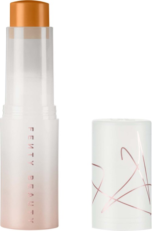 A white bottle with a gold cap and pink text, next to a white cap with pink and red lines.