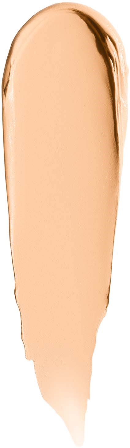 A beige skin-colored beauty blender sponge with brown edges.