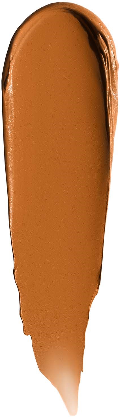 A swatch of brown liquid makeup or foundation with a tapered end.