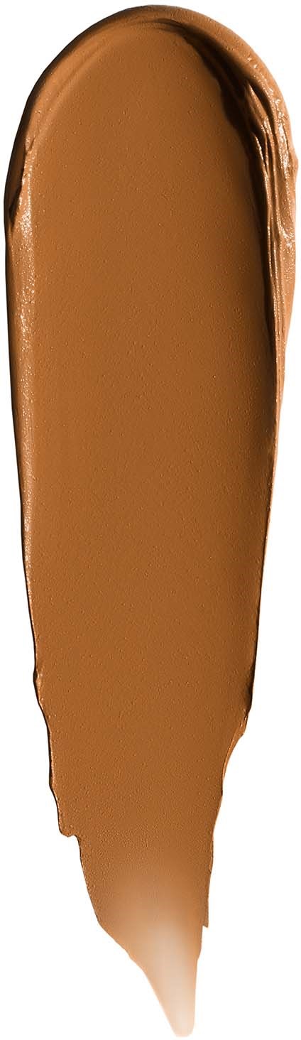 A swipe of brown creamy substance, possibly chocolate or makeup, on a white background.