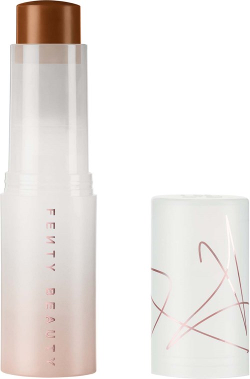 A cosmetic bottle with a brown cap and a white base, next to a white cap with pink scribbles.