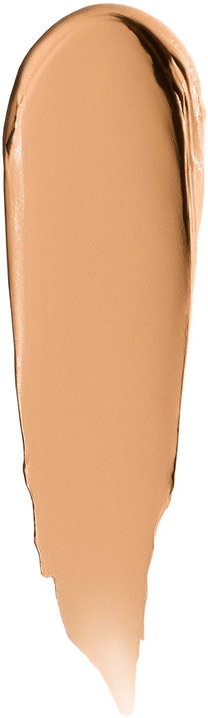 A dollop of beige liquid makeup or foundation with a smear at the top.