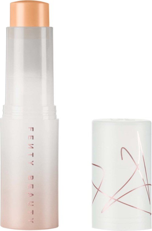 A white bottle with a peach cap, labeled "FEMME BEAUTY," and a separate white cap with pink lines.