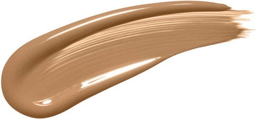 A beige-colored cream or foundation swatch with a smooth, glossy texture. It appears thick and well spread.