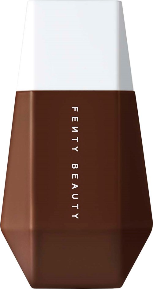 A brown cosmetic bottle with the words "FENTY BEAUTY" vertically on it and a white cap.