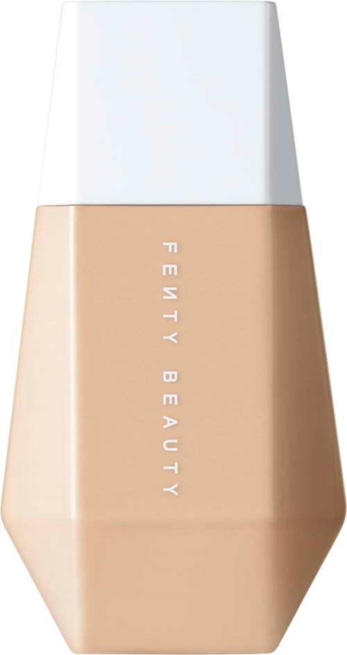 A beige bottle with a white cap labeled "FENTY BEAUTY."