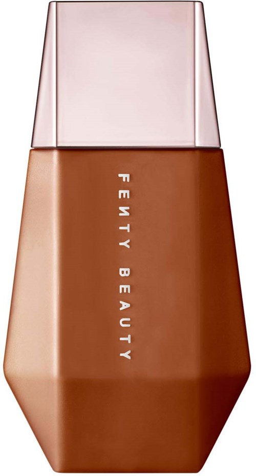 A bottle labeled 'FENTY BEAUTY' with a pink cap and a brown body.