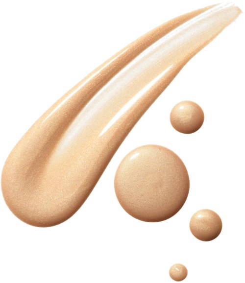 Three beige-colored cream blobs and a streak form a swirl pattern.