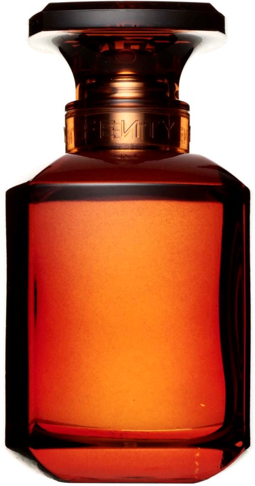 A small amber bottle with a black cap, likely a perfume or essential oil container.