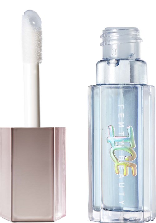 A clear lipstick or lip gloss tube with an open cap and wand applicator.